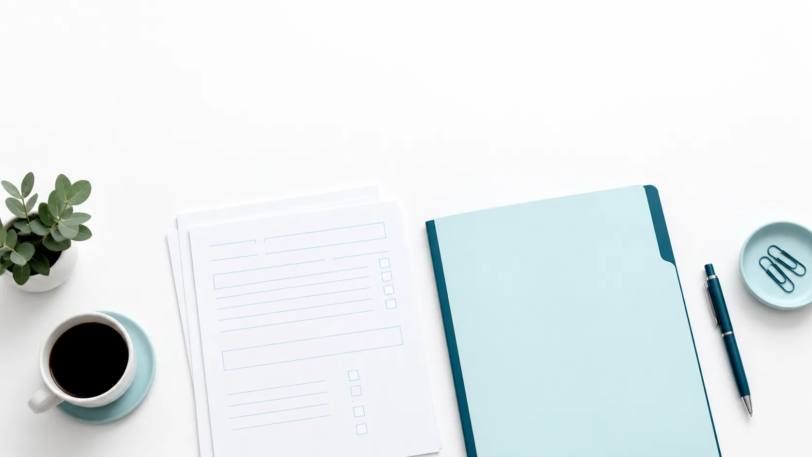 A single stack of blank sheets beside a closed pale folder on a white surface, with clear space above.